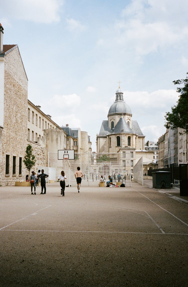 Photo Of Children Playing Basketball