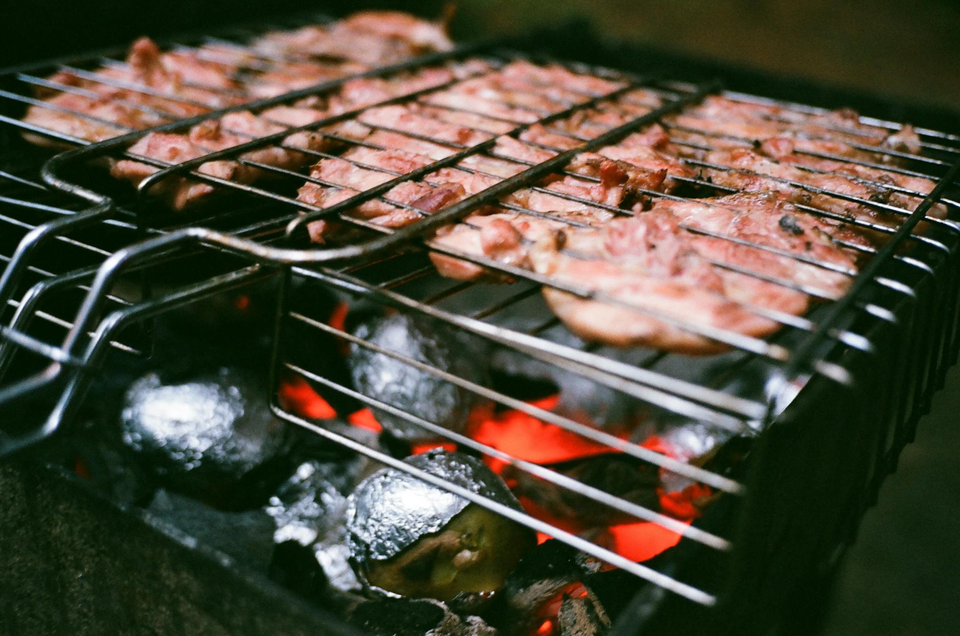 cooking meat in a grill