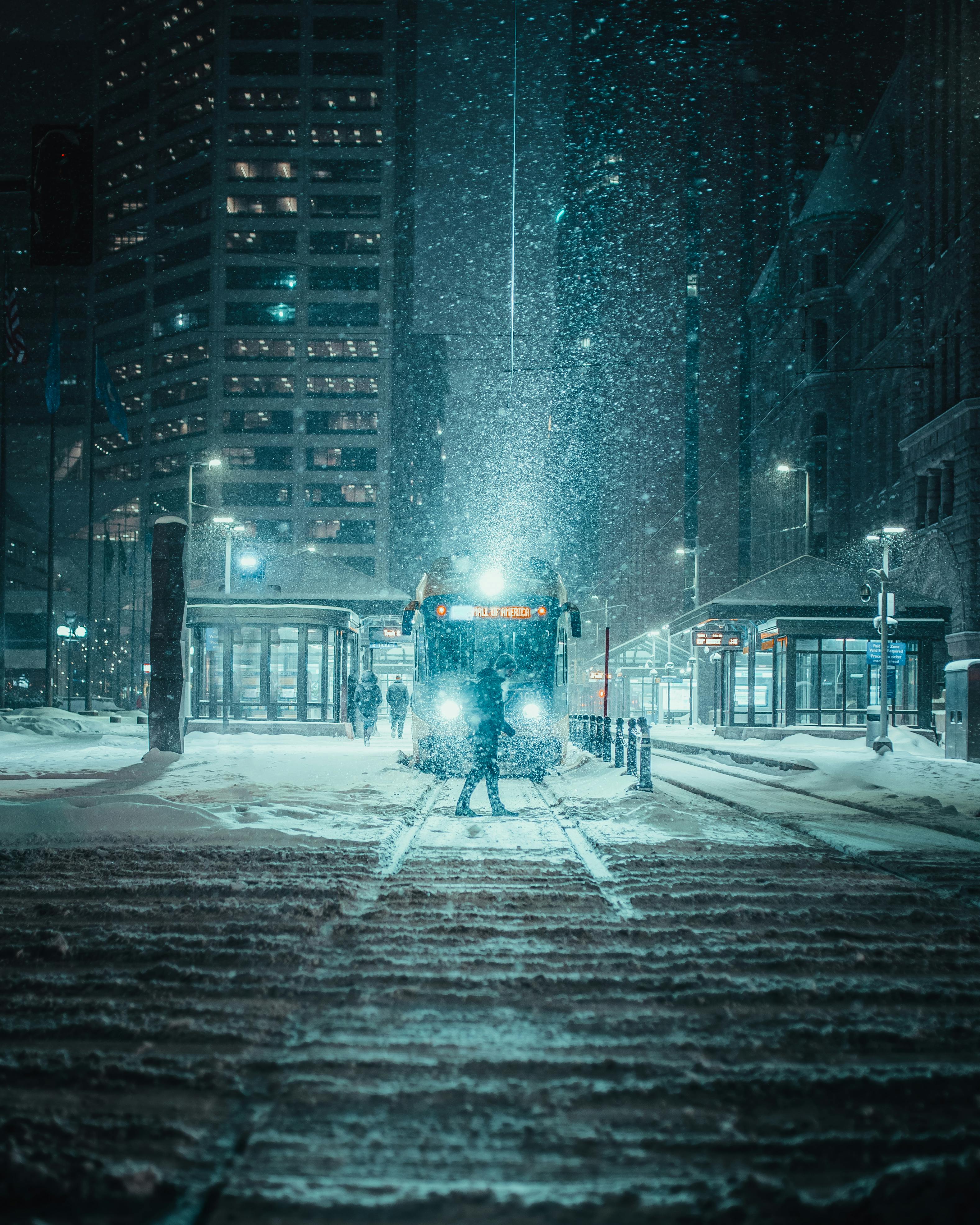 person standing in front of a train