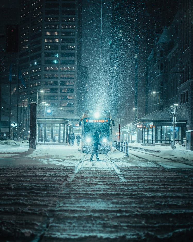 Person Standing In Front Of A Train