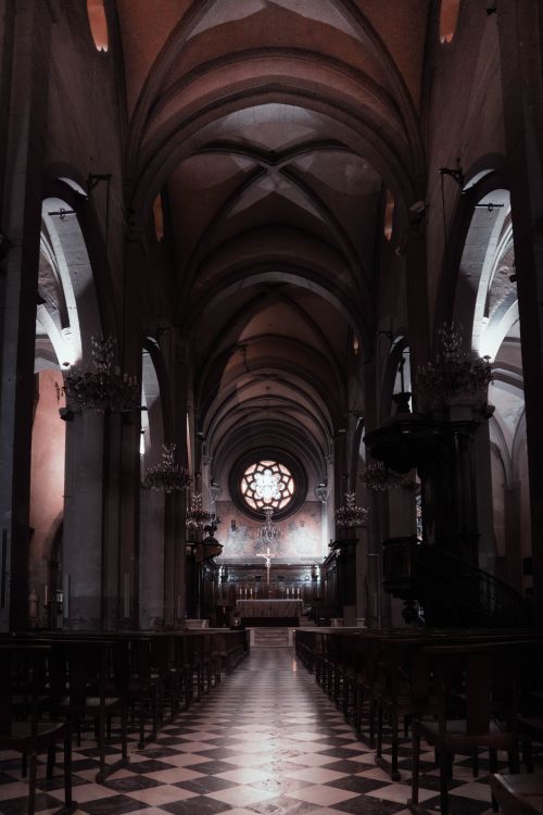 Free Explore the stunning Gothic architecture of Toulon's cathedral with this atmospheric interior shot. Stock Photo