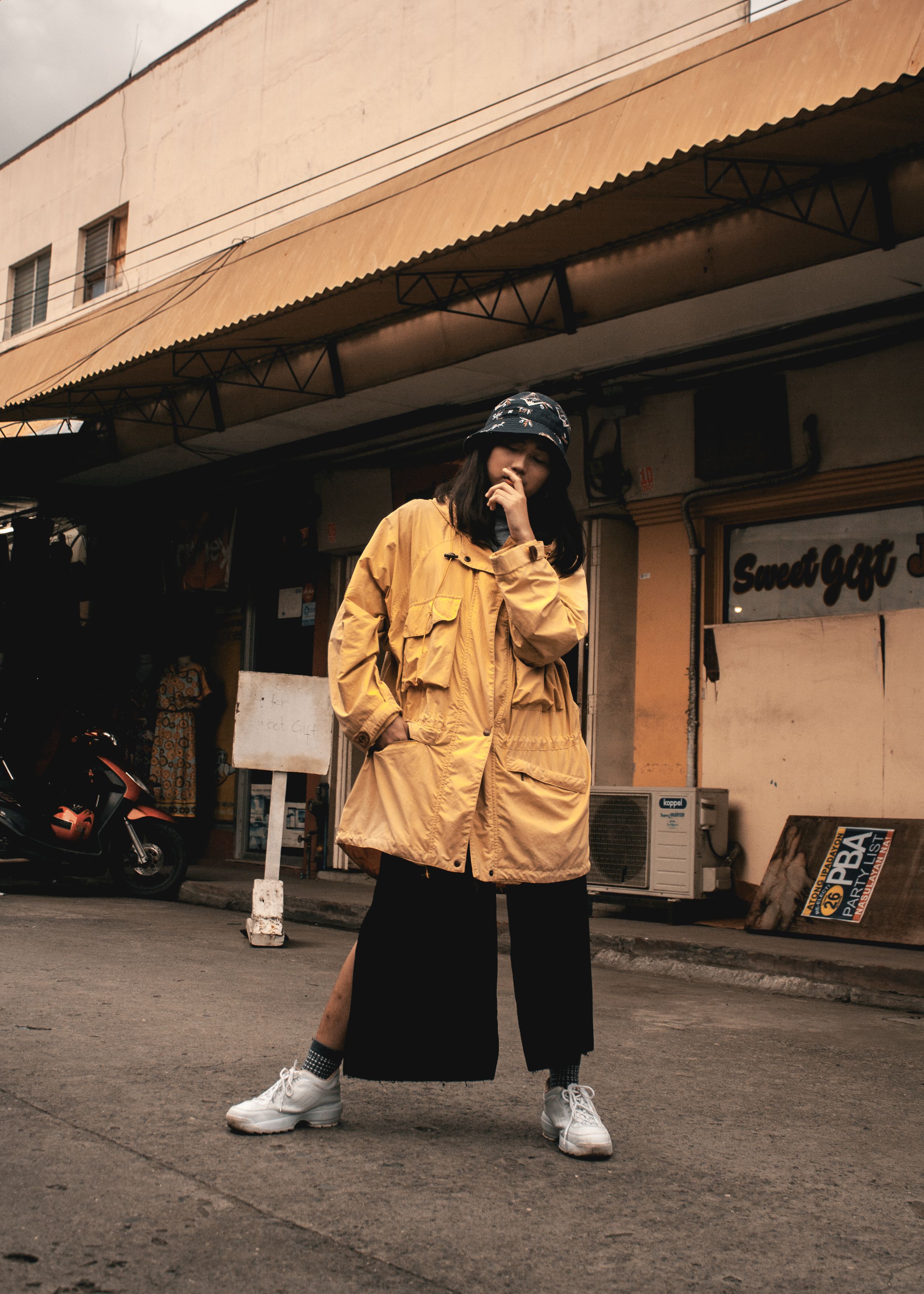 Photo of Woman Standing in the Street Posing · Free Stock Photo
