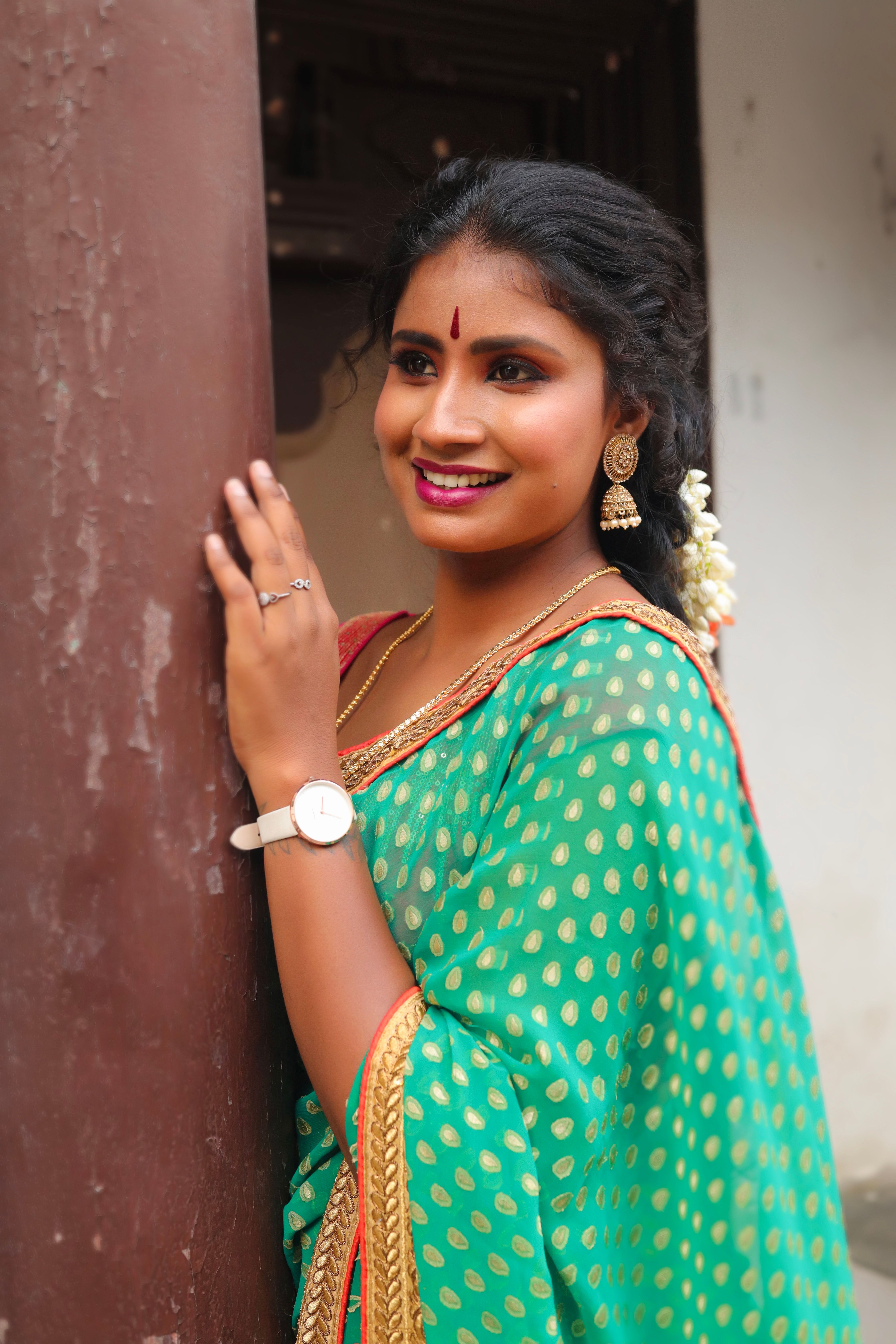 Smiling Woman in Traditional Clothing · Free Stock Photo