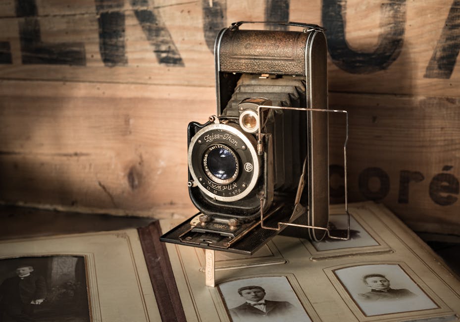 Vintage Black Camera on Brown Surface