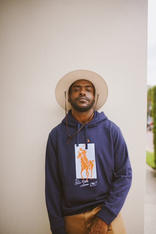 Portrait of Man in Hat and Hoodie