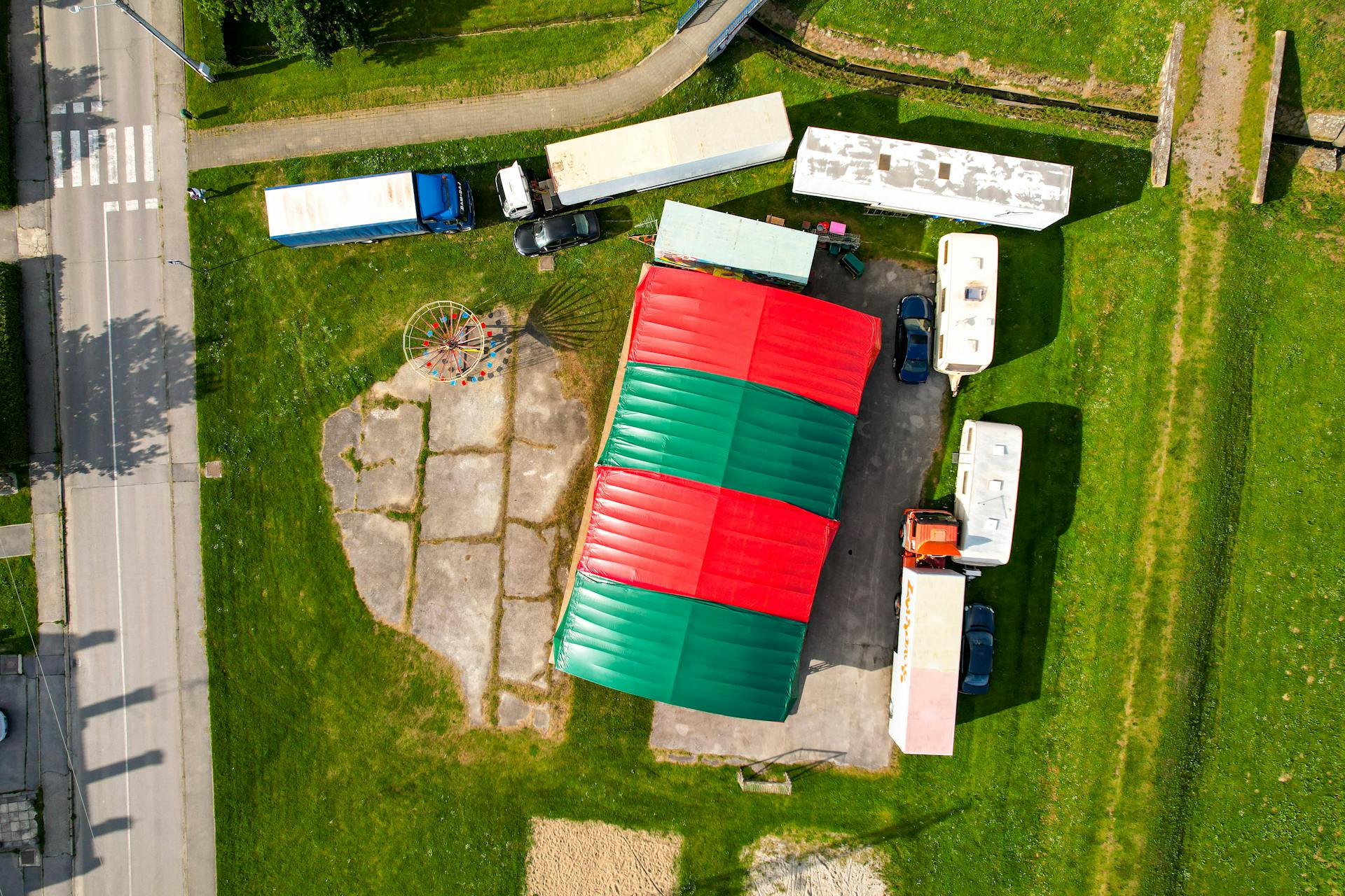 Drone Shot of Trucks Parked near a Building