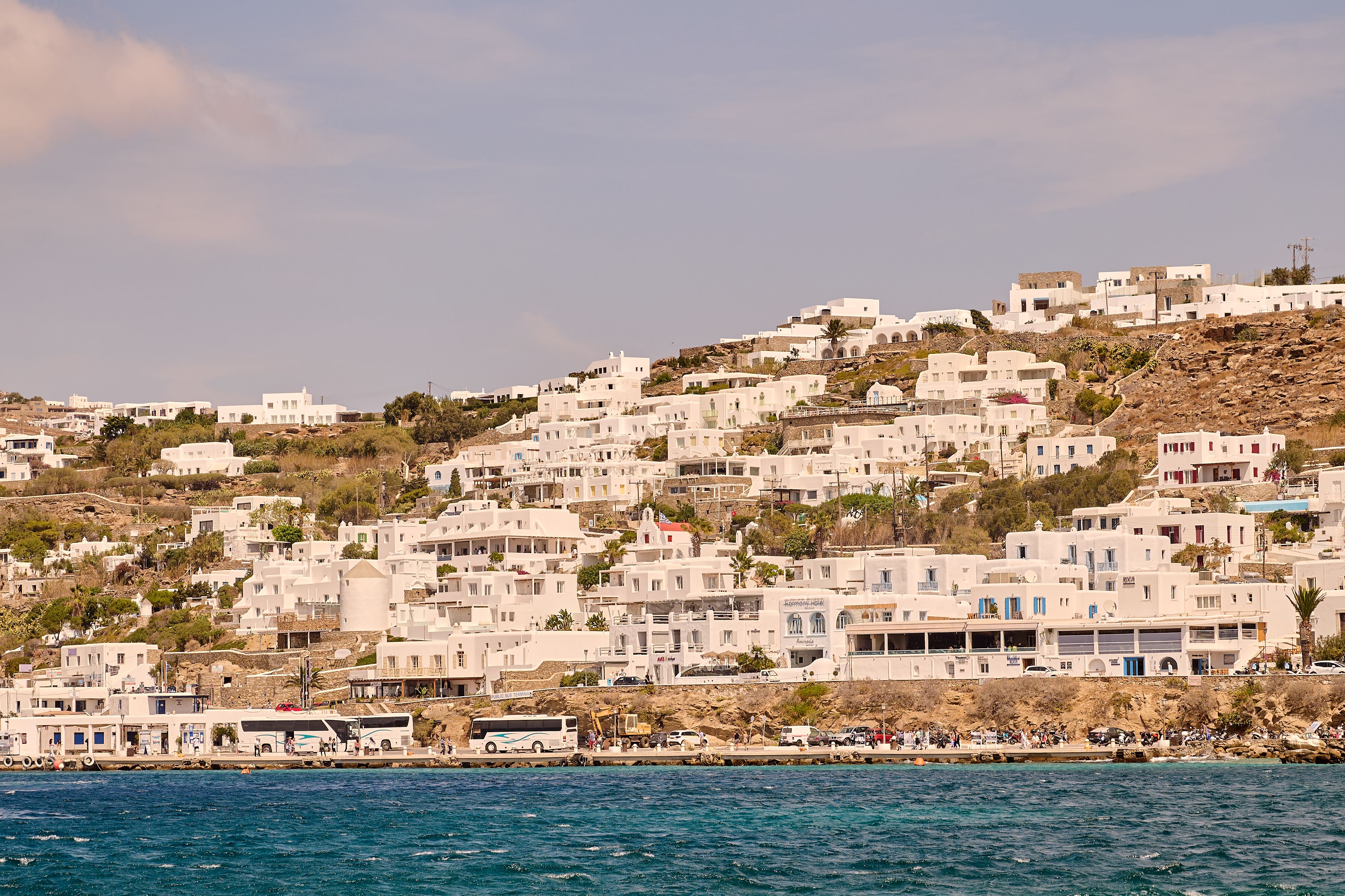 Free Breathtaking view of iconic whitewashed buildings on Mykonos Island, Greece coast. Stock Photo