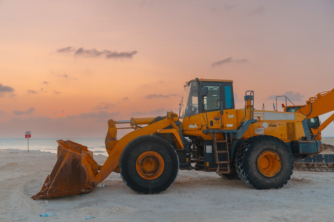 Kostnadsfri bild av bulldozer, byggande av strandplats, byggarbete