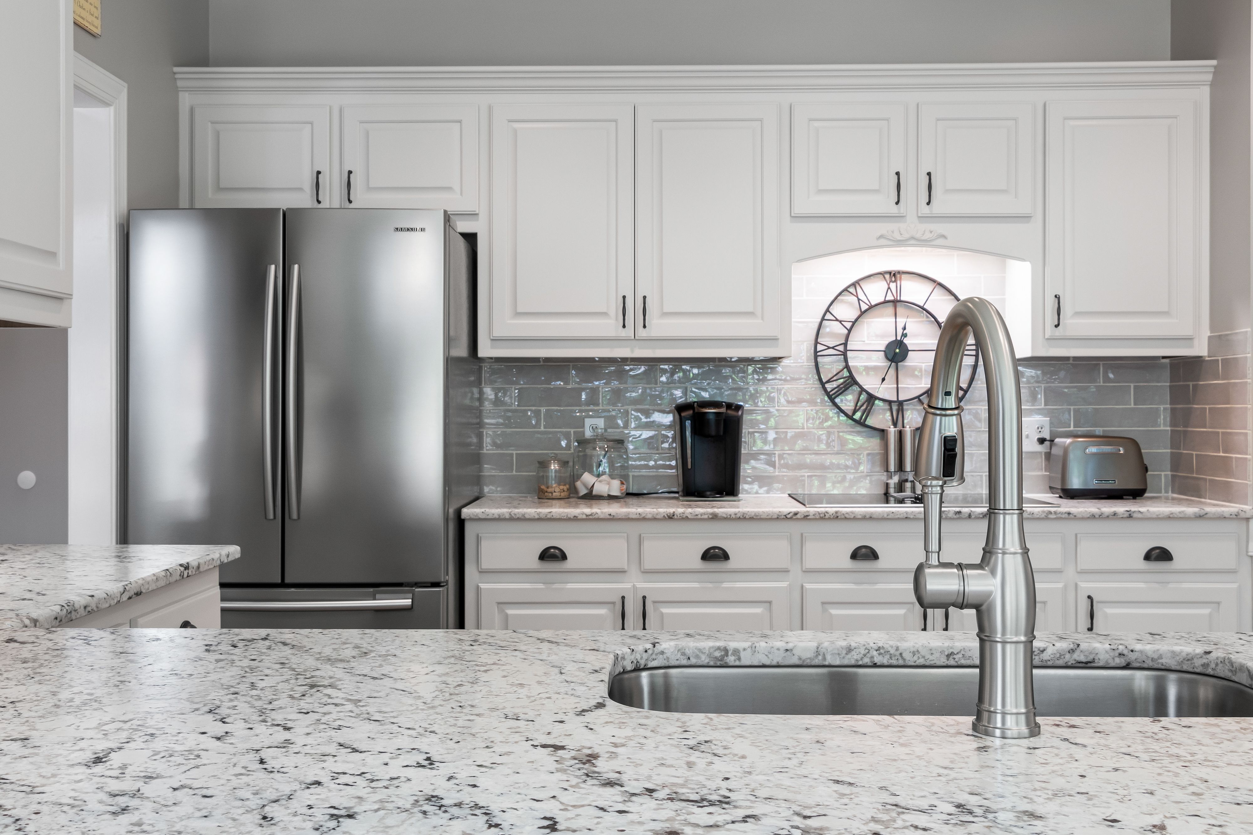 White Fridge Beside Kitchen Cabinet with Sink · Free Stock Photo