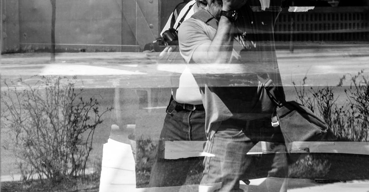 Elderly Men with Cameras on Reflection on Window · Free Stock Photo