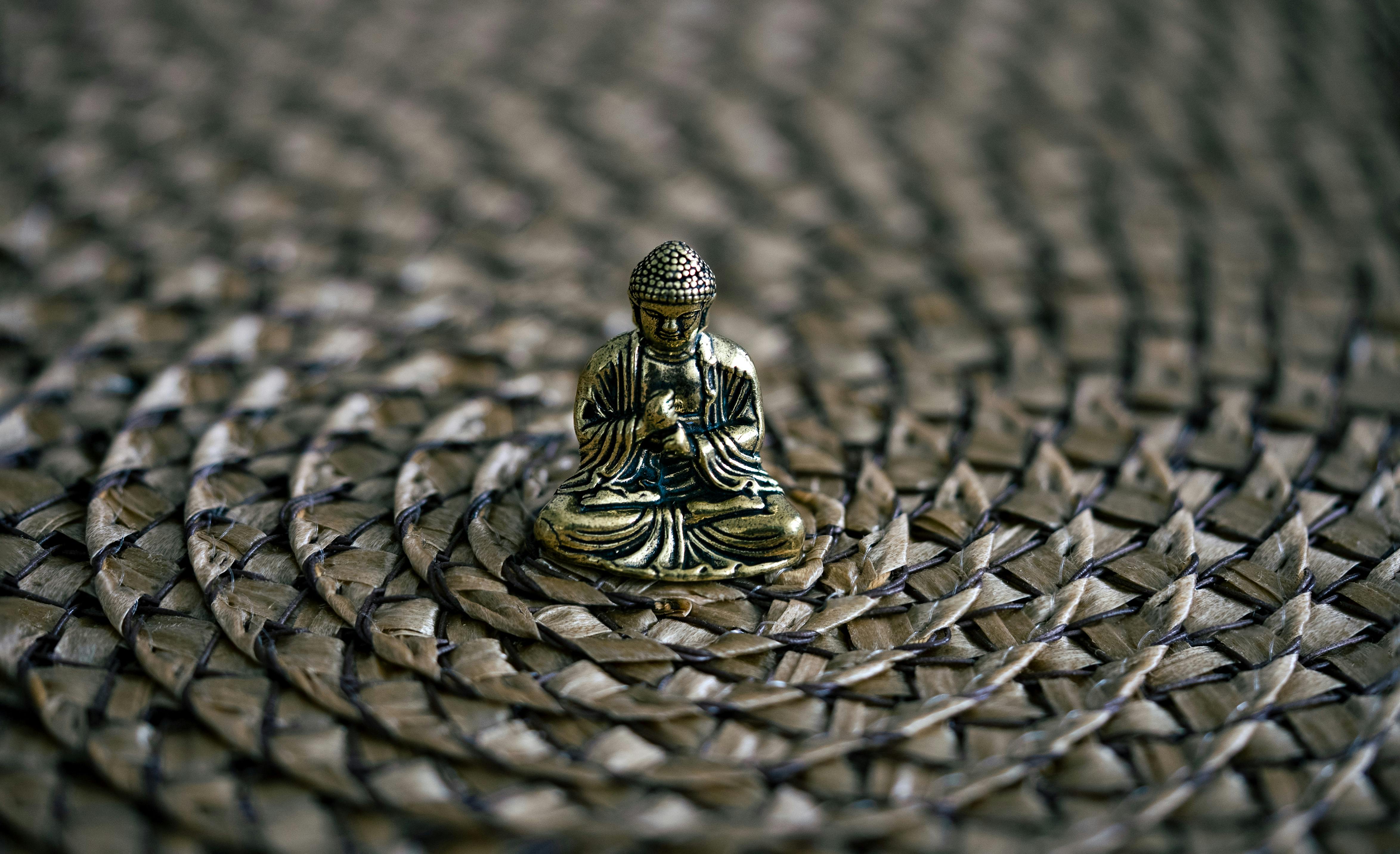 close up of a small buddha figurine