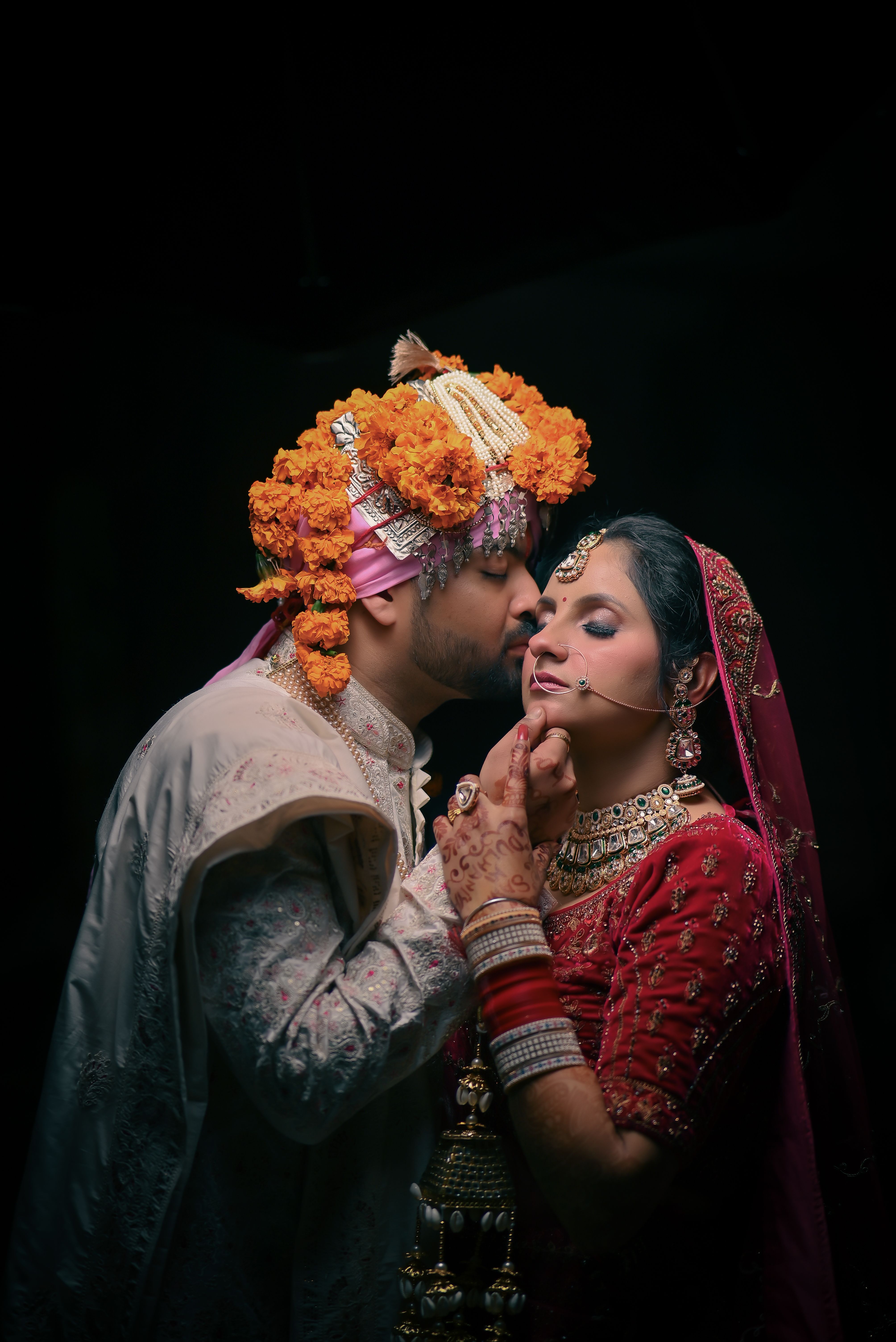 Newlywed Couple in Traditional Indian Wedding Attire · Free Stock Photo