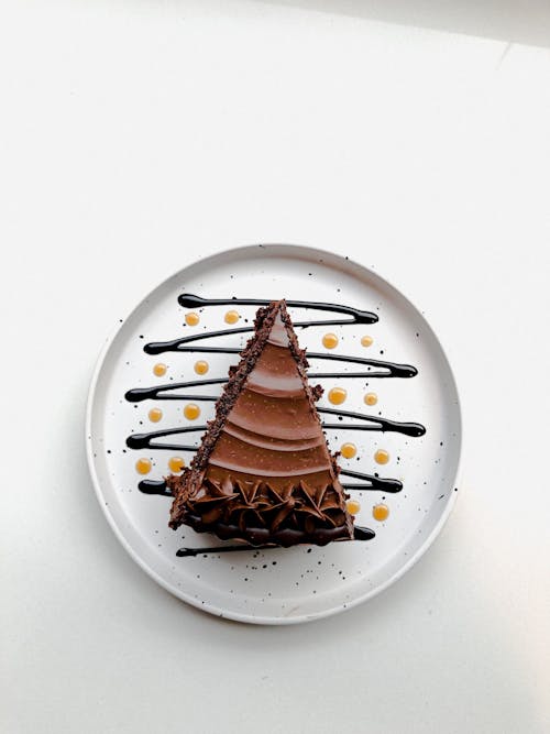 Free Top View of a Piece of Chocolate Cake on a Plate  Stock Photo