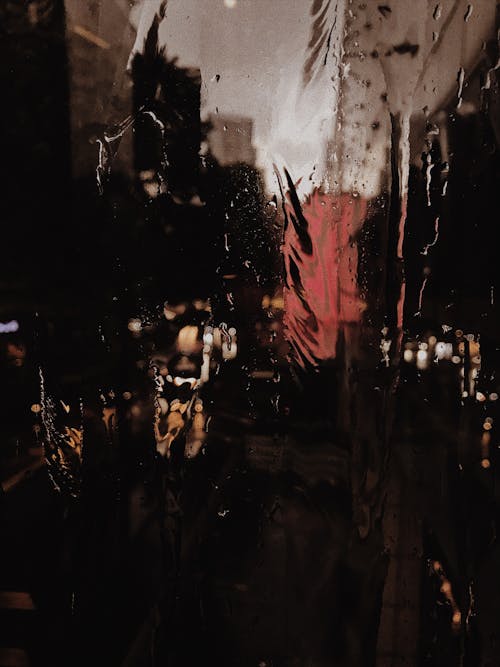 Close-Up Photo of Water on Glass Window