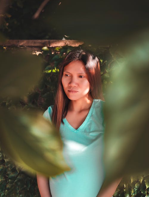 Selective Focus of Woman Wearing Teal Shirt