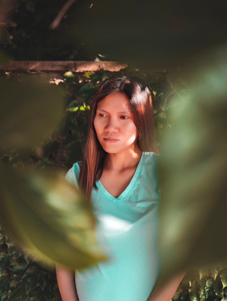 Selective Focus Of Woman Wearing Teal Shirt