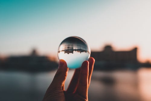 Person Holding Lens ball 