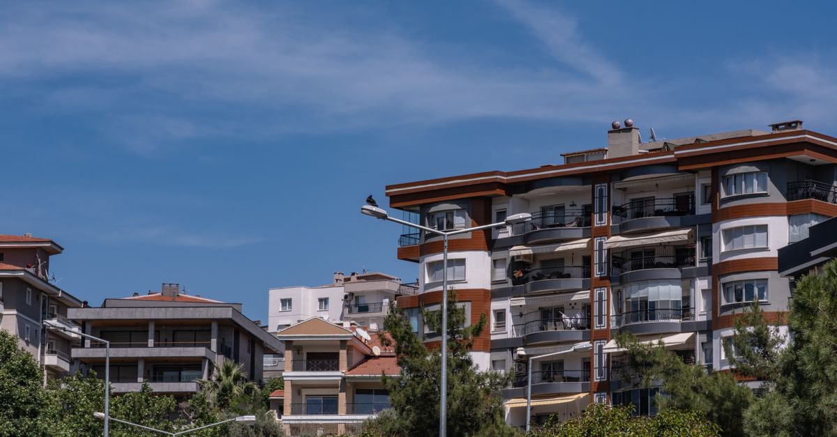 Stylish urban apartments in Bornova, İzmir under a clear blue sky.