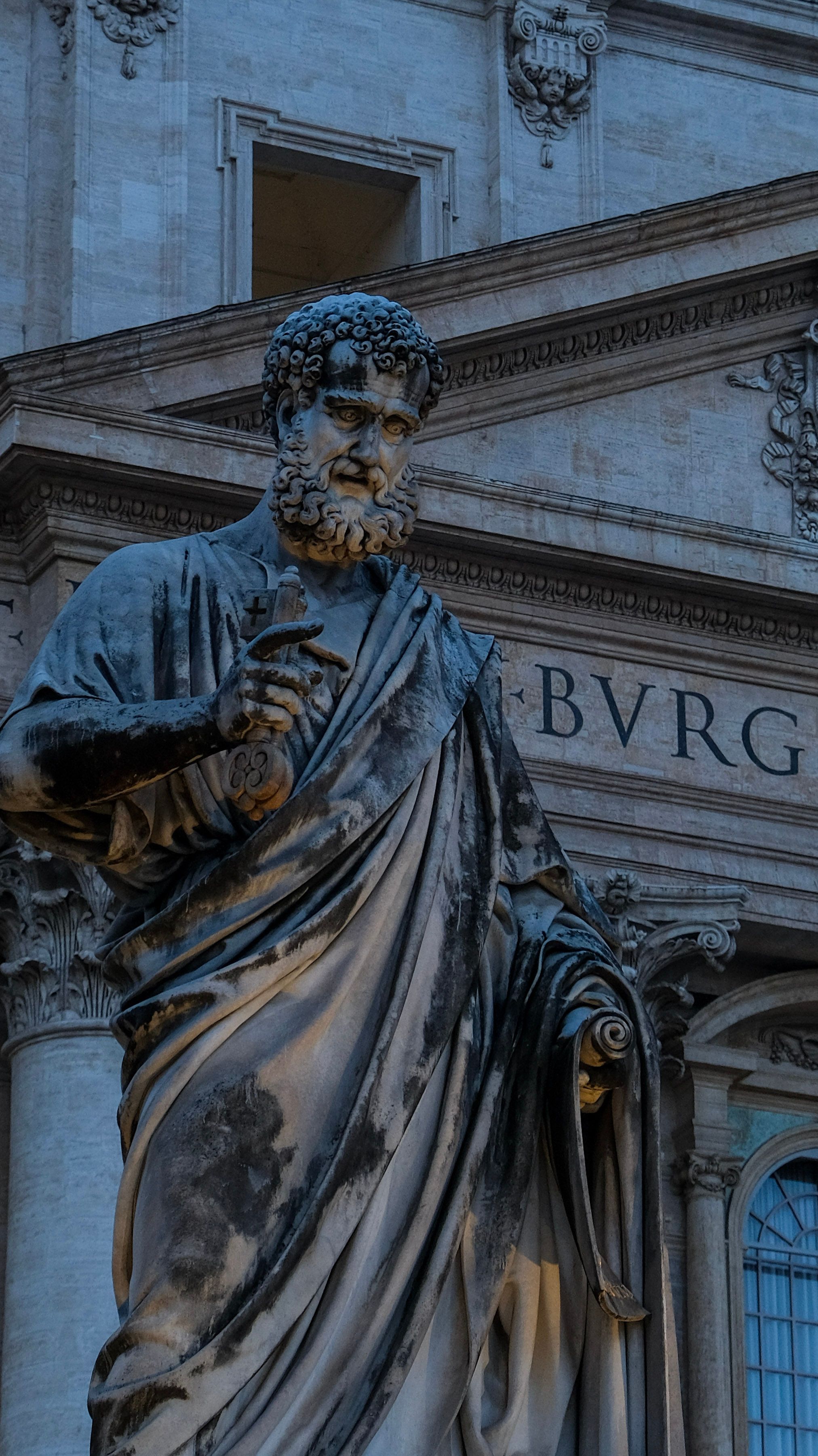 Close-up of the Saint Peter statue outside St. Peter's Basilica in Vatican City.