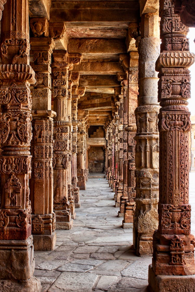 Photo Of Hallway Of Brown Stone Columns