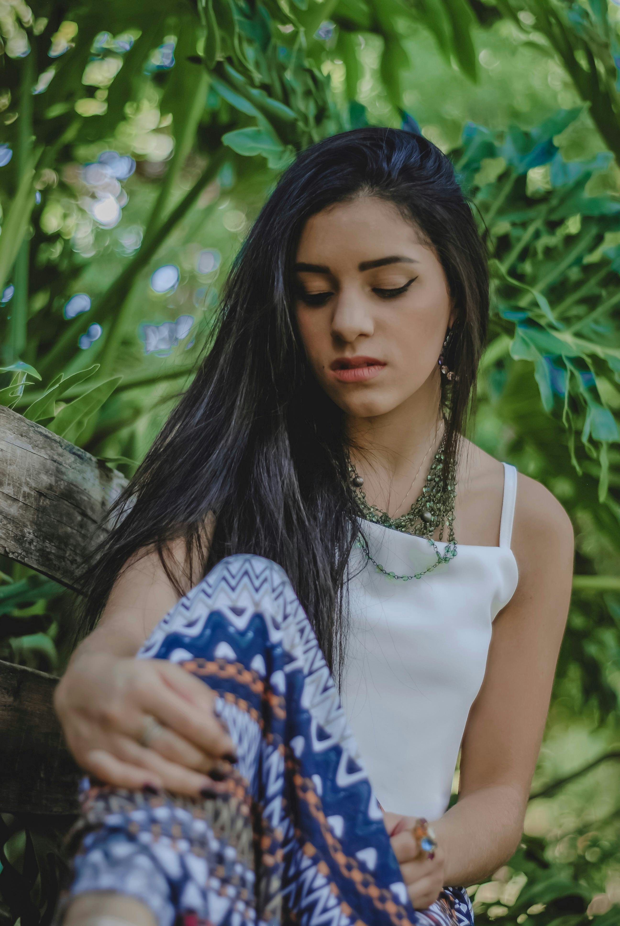 Photo of Person Standing Near Plants · Free Stock Photo