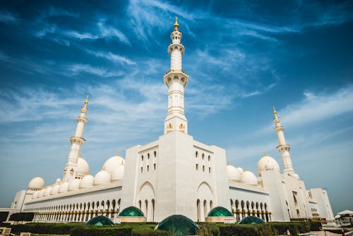 White Painted Buildings Under Blue Sky