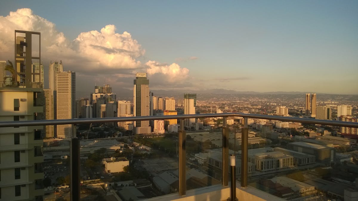 Close-up of a plant-based bowl with grains, vegetables, and a creamy dressing