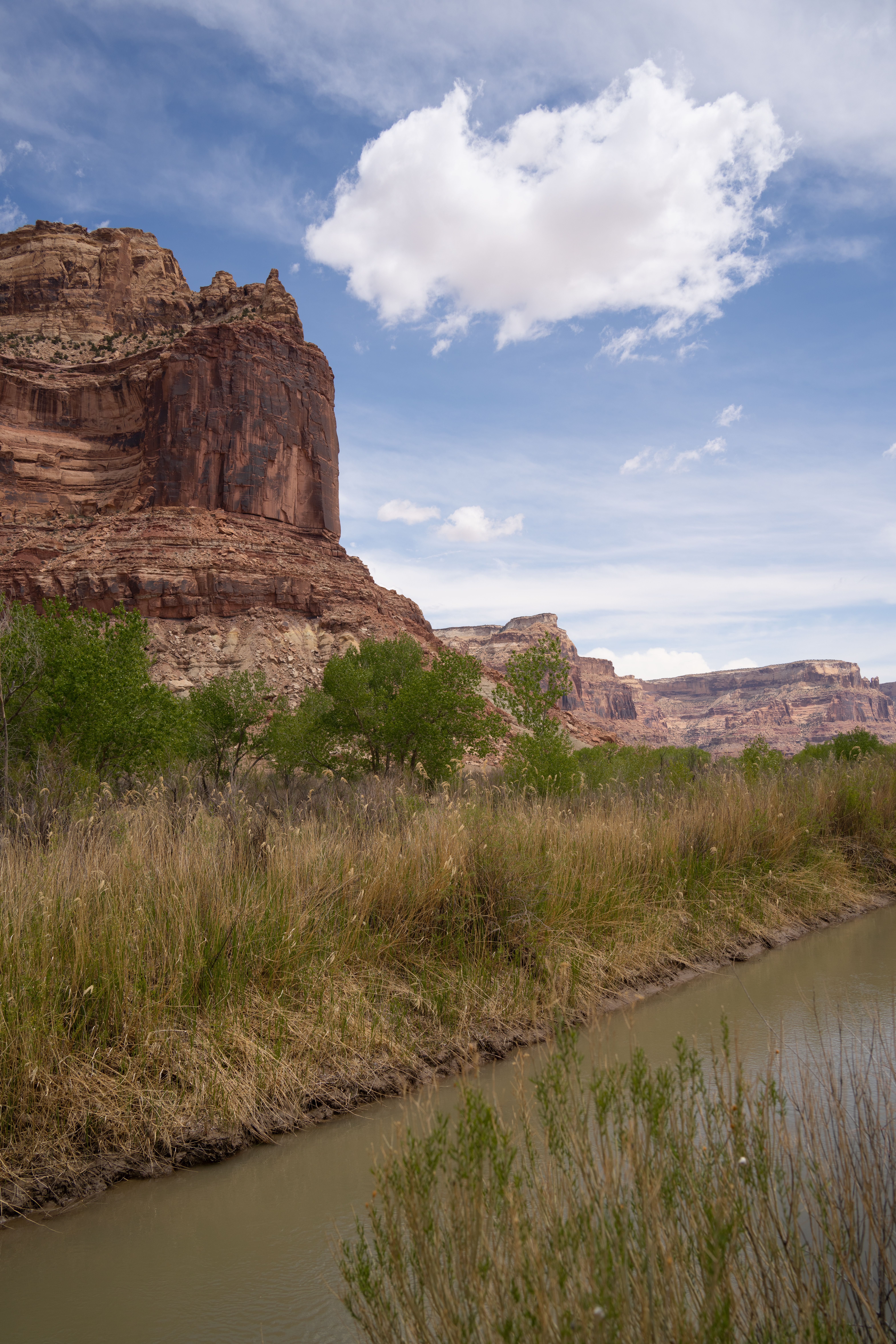 A river runs through a canyon with tall rocks · Free Stock Photo