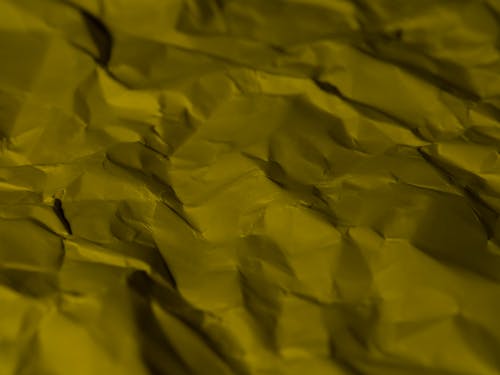 yellow crumpled paper texture pattern