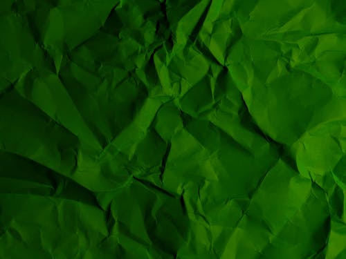 green crumpled paper texture pattern