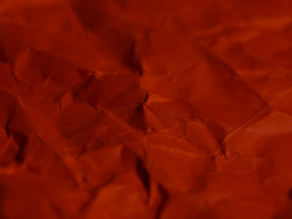 orange wrinkled paper texture background