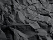 gray crumpled paper texture pattern