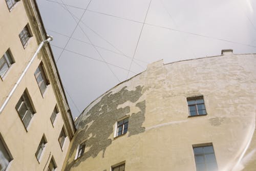 A building with a large window and wires