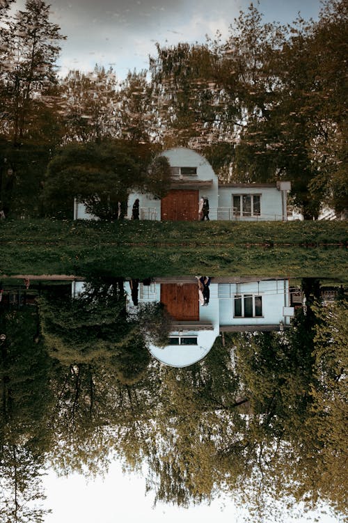 A house is reflected in the water