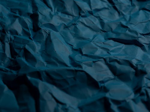 blue crumpled paper texture pattern