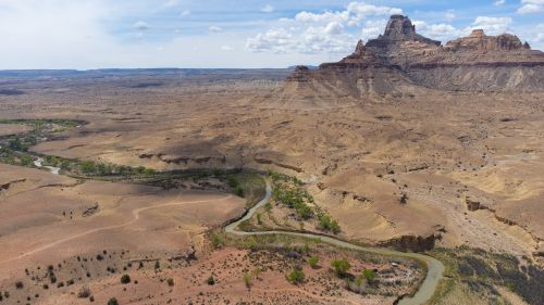 Free Breathtaking aerial view of San Rafael Swell in Utah, showcasing barren landscapes and winding river. Stock Photo