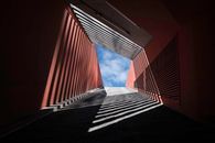 Captivating shadows and light create an abstract pattern in a Hamburg tunnel.
