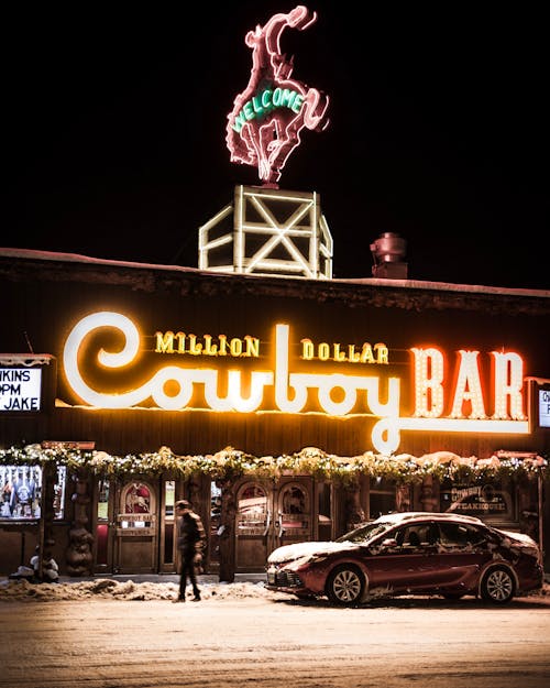 Free Photo of Cowboy Bar Signage Stock Photo