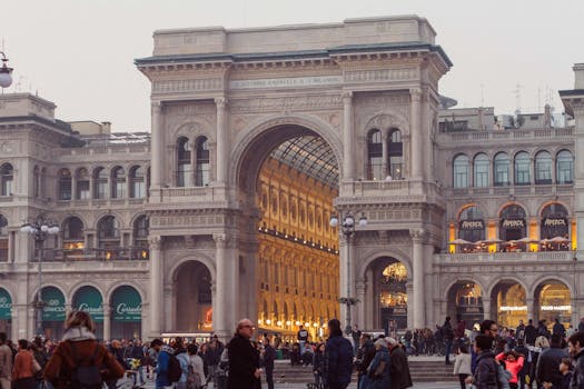 Crowds gather at the iconic Galleria Vittorio Emanuele II, a landmark shopping arcade in Milan, Italy.
