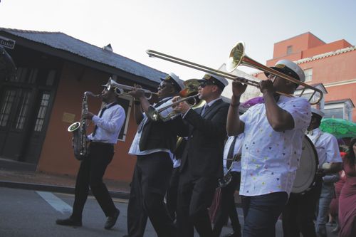 Free Dynamic street performance featuring a lively jazz band in action. Stock Photo