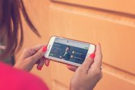 Person Holding Iphone