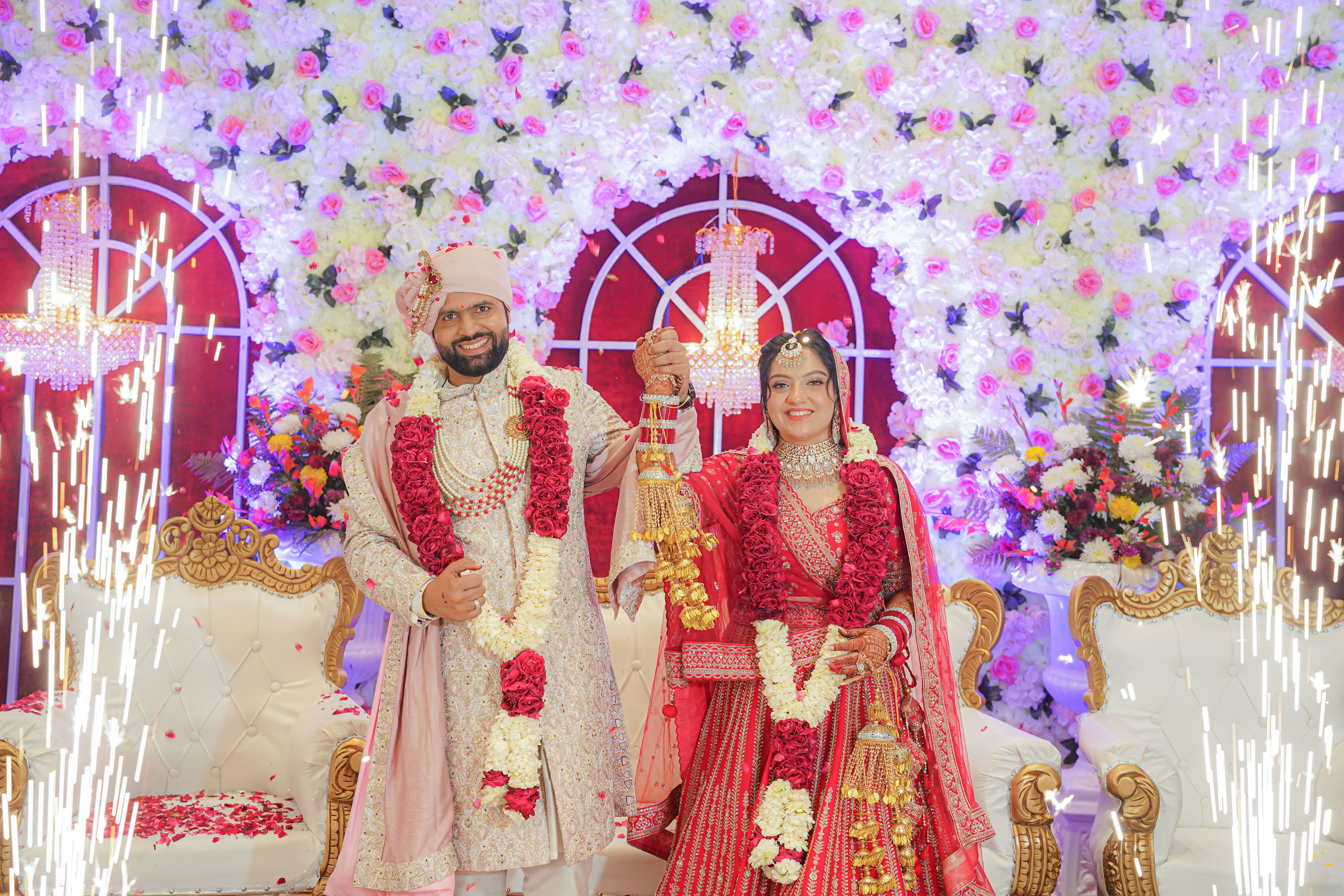 Traditional Indian wedding with bride and groom in vibrant attire, Delhi, India.
