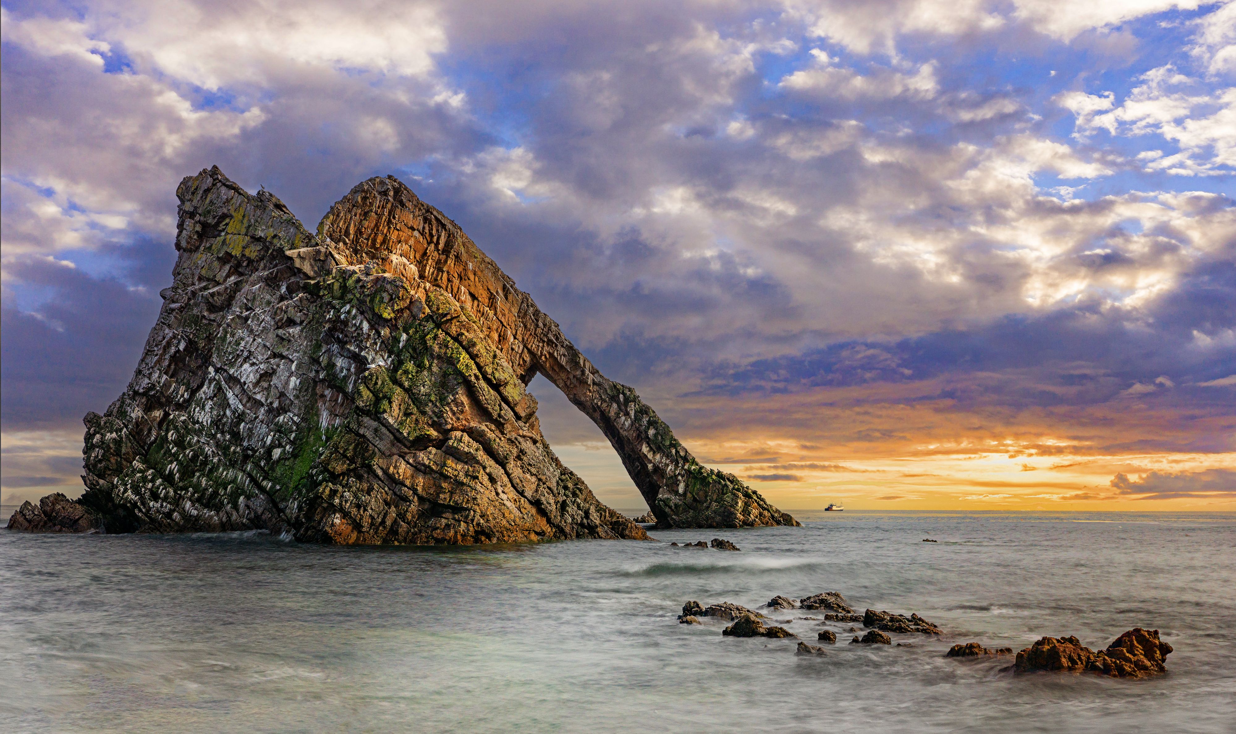 Bow Fiddle Rock on Sea Shore in Scotland at Sunset · Free Stock Photo