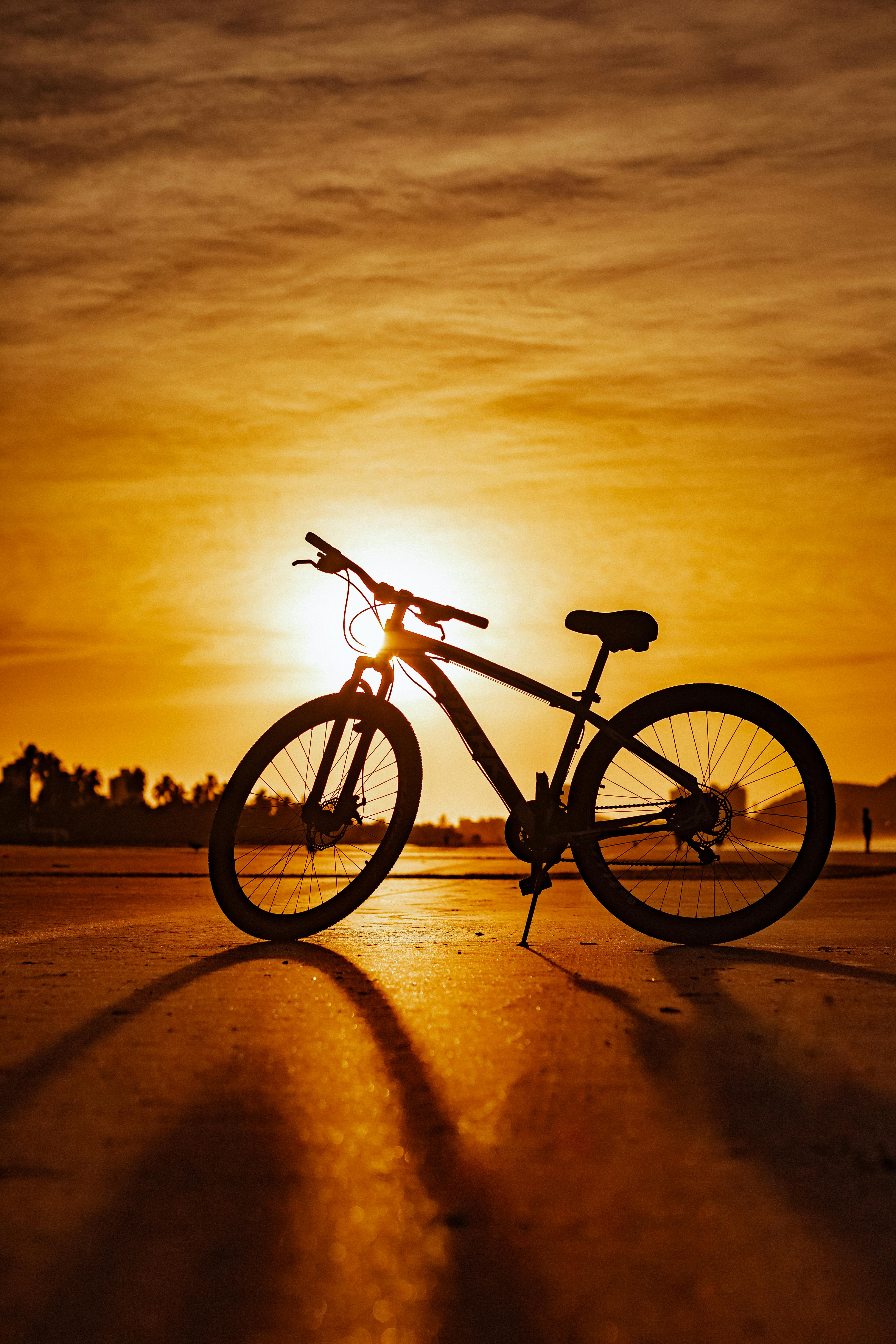 Silhouetted Bicycle on the Background of a Bright Sunset