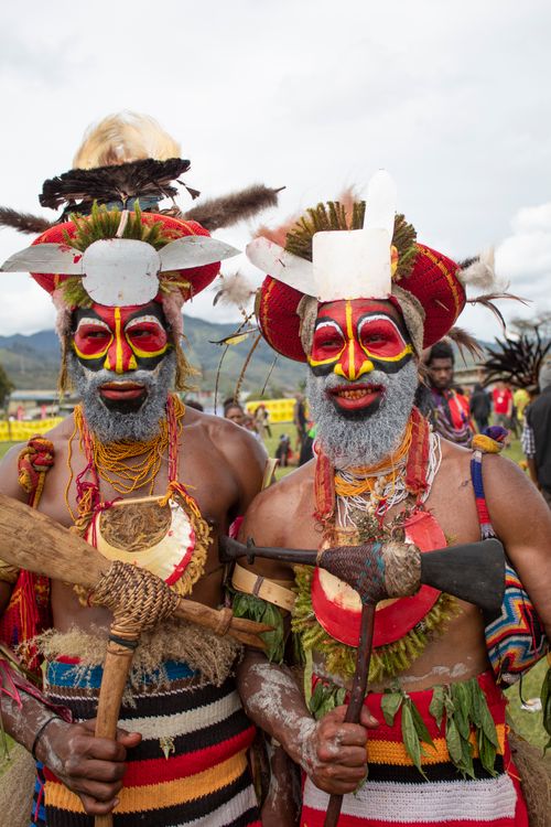 Free Two men in traditional Papua New Guinea attire at a cultural festival in Lae. Stock Photo