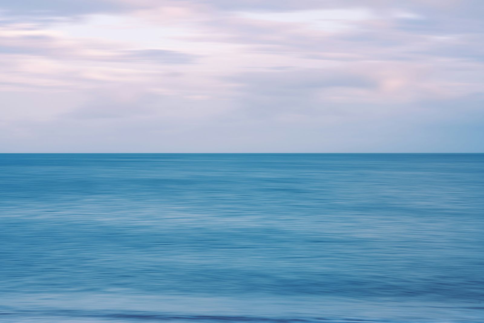 Long-exposure seascape under a pastel sky — Jack Atkinson on Pexels