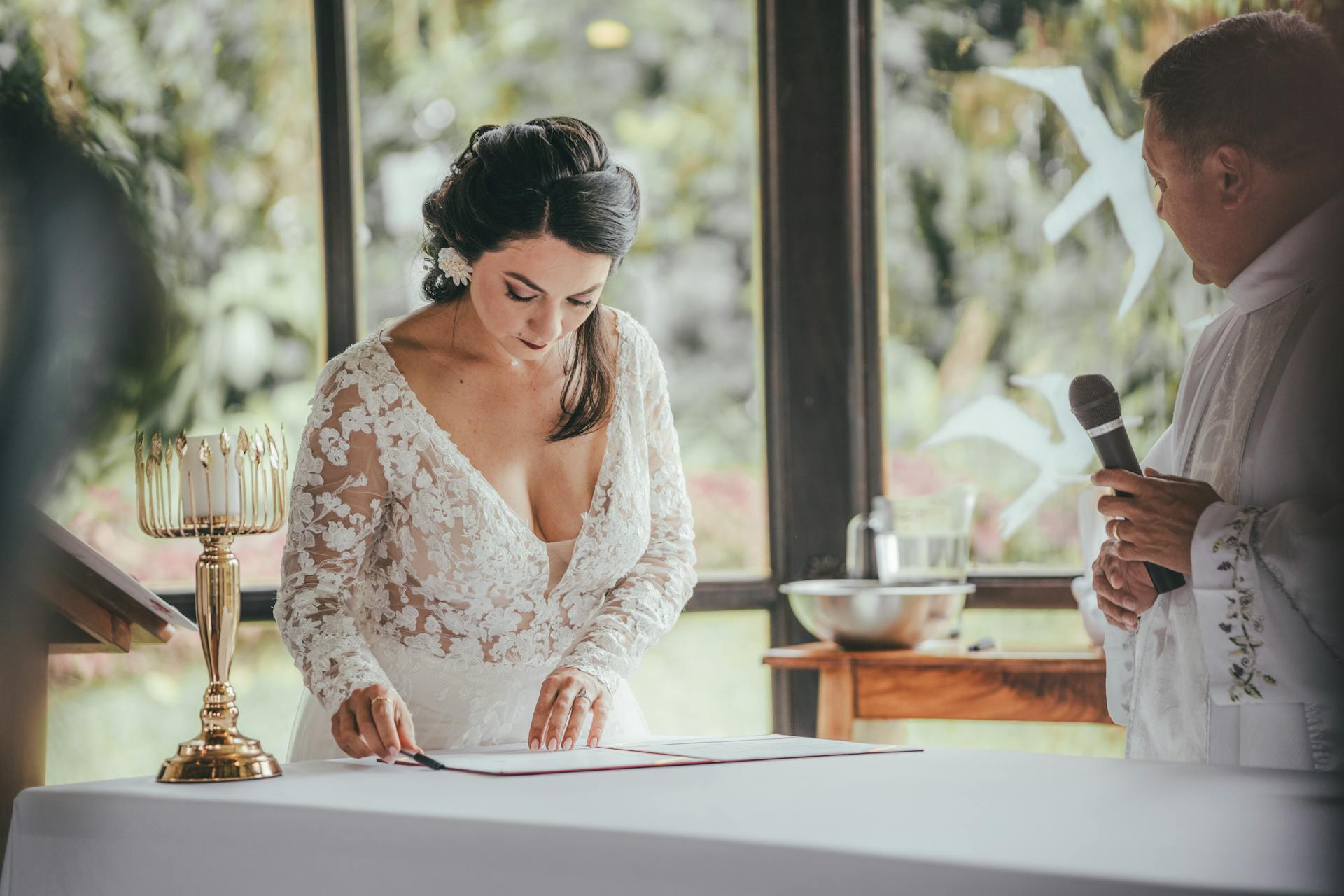 Bride Signing the Marriage Certificate