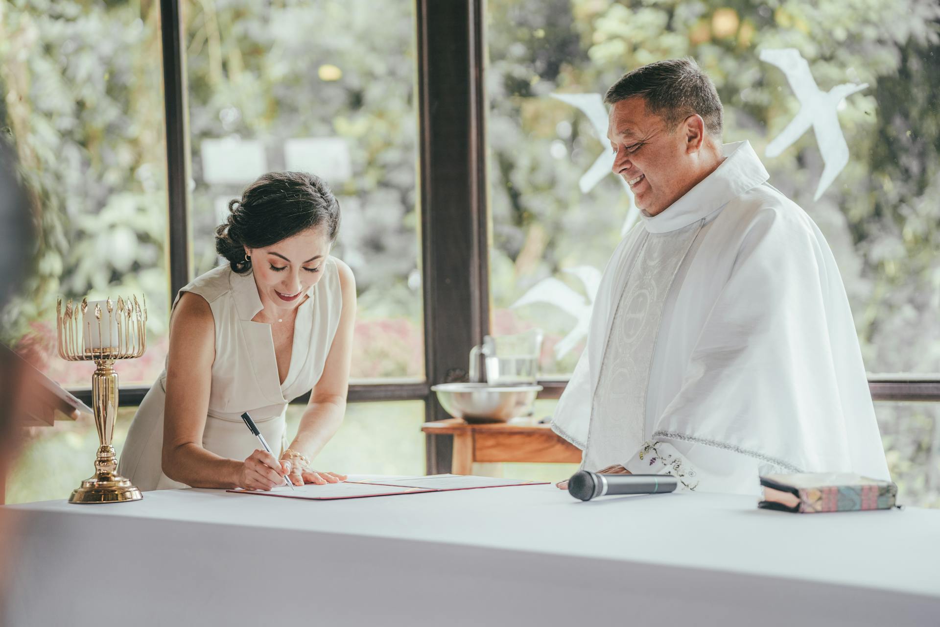 Maid of Honor Signing the Marriage Certificate