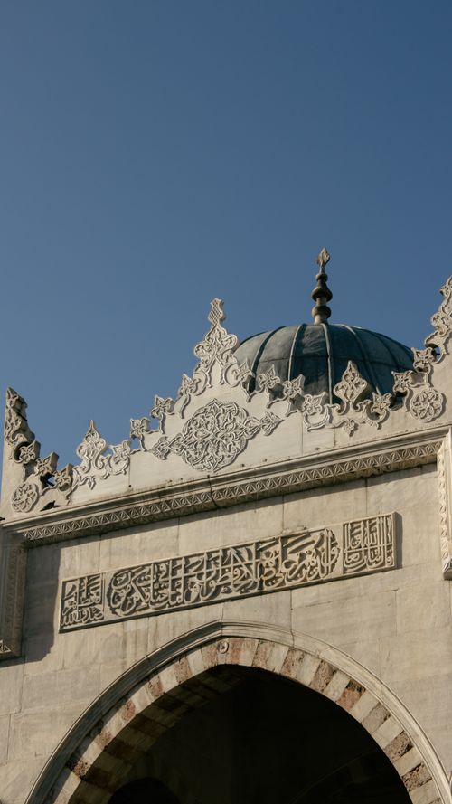 Free Intricate Ottoman architectural dome detail of the New Mosque in Istanbul, Turkey. Stock Photo