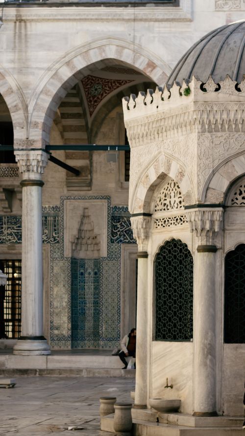 Free Explore the detailed Ottoman architectural features of the New Mosque in Istanbul, showcasing historical elegance and Islamic artistry. Stock Photo